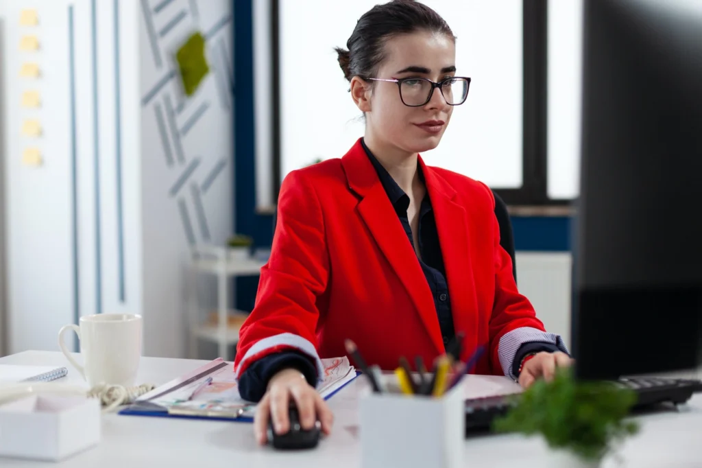 businesswoman in business corporate workplace workspace wotking on computer